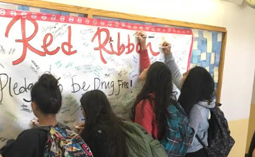 Greeley West students pledge to be drug free earlier this week.