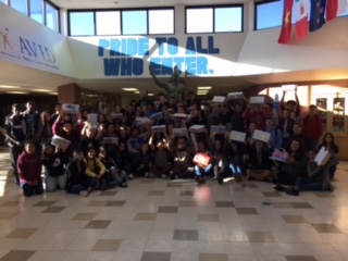 AVID sophomores pose with their gifts as part of Project Christmas Box.