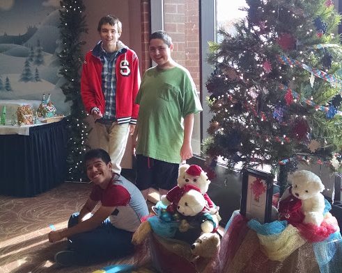 Greeley West IA students pose for a picture in front of their finished tree that they submitted to the Tree Festival the Union Colony Civic Center.