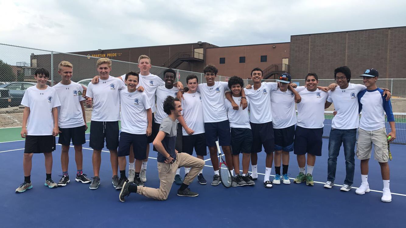 The Greeley West tennis team poses for a picture after their victory against Greeley Central on Wednesday afternoon at Greeley West High School.