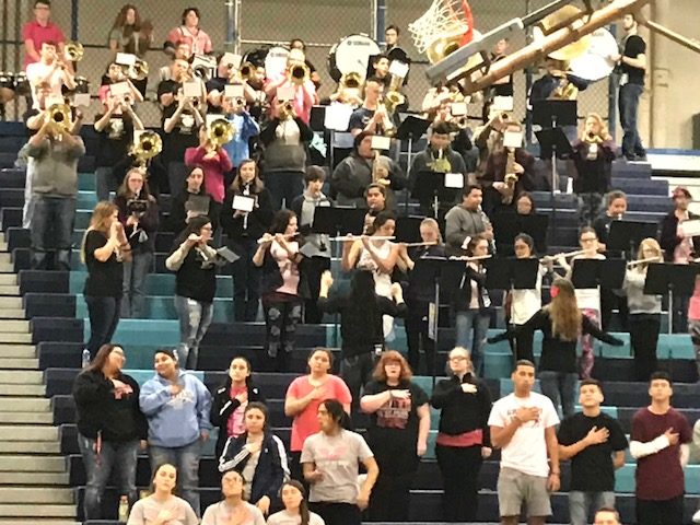 The Greeley West pep band plays the national anthem before a girls basketball game this season. 