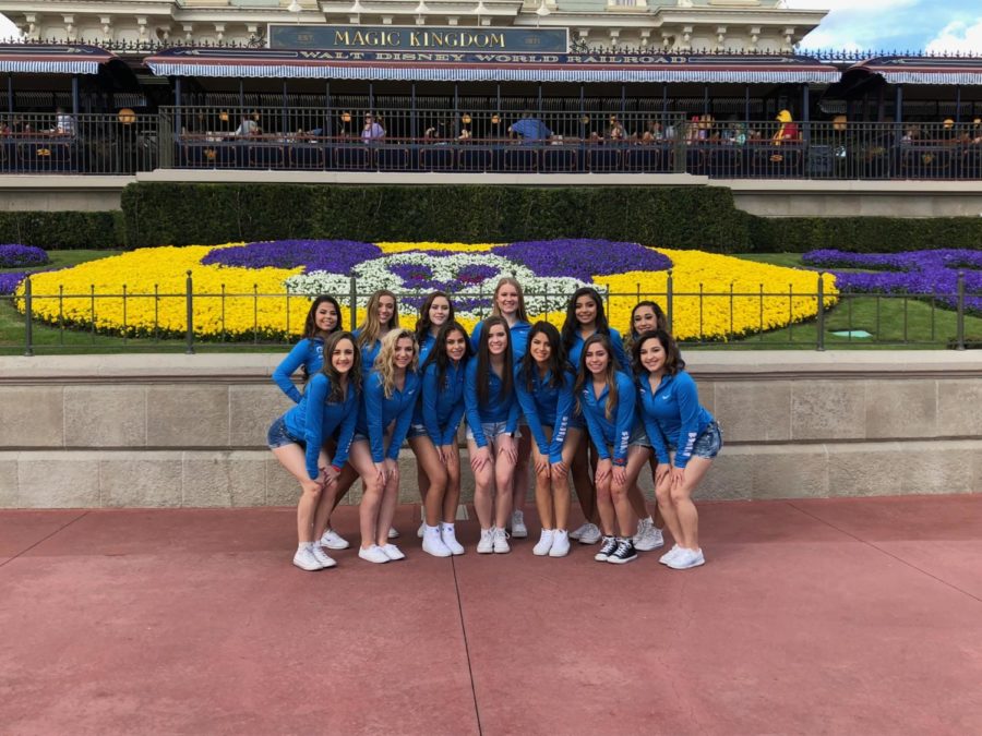 The Poms pose at Disneys Magic Kingdom.