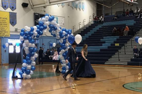 Will Wingfield and Elizabeth Henry show off their Prom style at an assembly on Thursday.