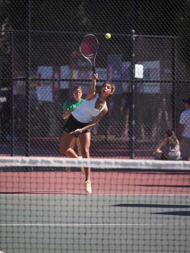 Hana Cropper serves the ball at the state tournament.