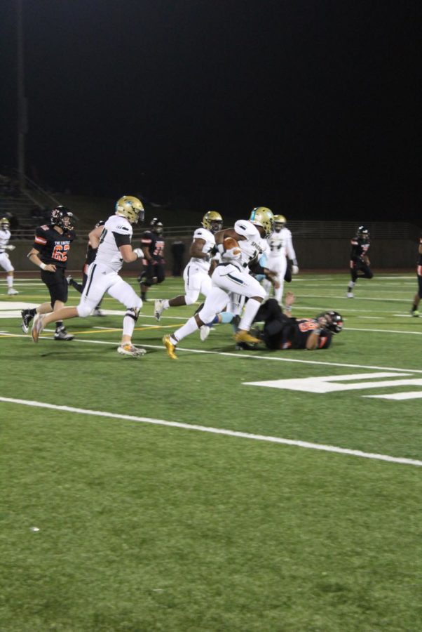 DJ Starks runs with the ball against Greeley Central earlier this season.