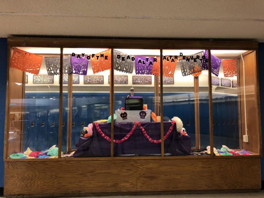 An alter is on display in the commons celebrating Dia De Los Muertos.  