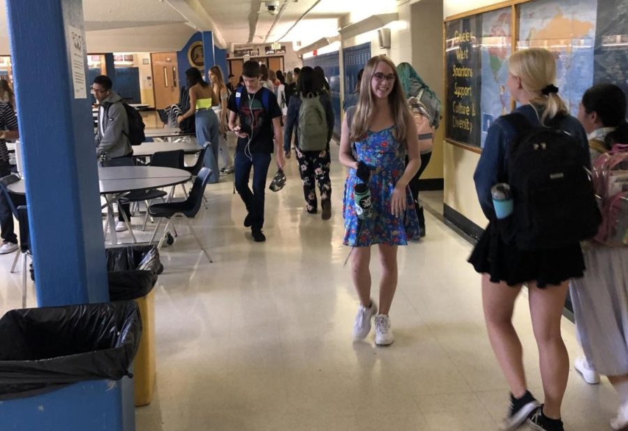 Colleen Cherry moves through the hallway during homeroom on Thursday.  