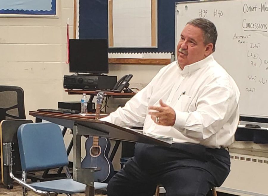 Greeley Mayor and District 6 Head of Security Mr. John Gates addresses student questions during a presentation on Friday in the choir room.  