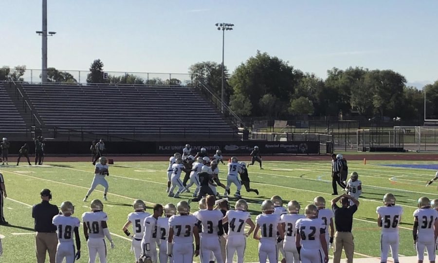 Aaron Rojas steps back to make a pass in the third quarter.