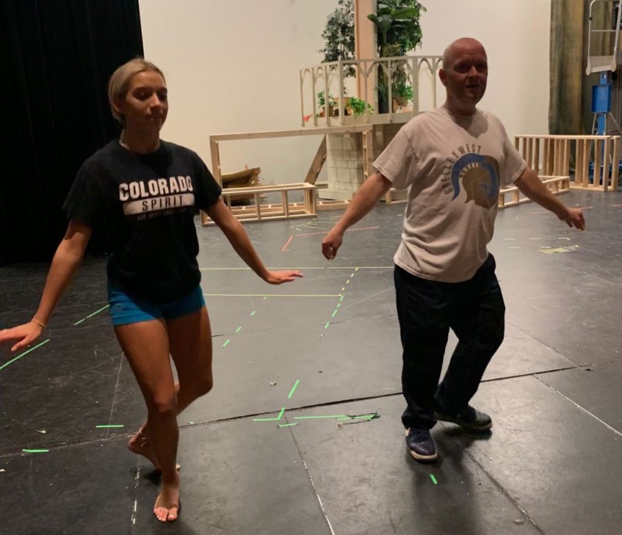 Junior Pom Chloe Job works through her routine with Mr. Troy Jarrell  for Saturday nights Dancing with the Teachers show.  