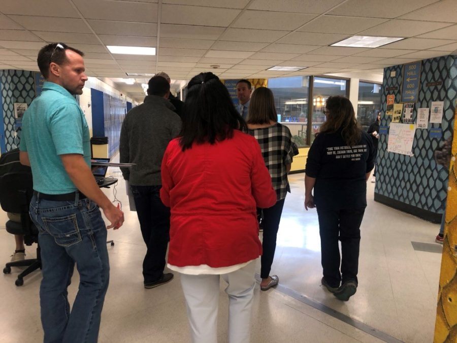 Principal Mr. Jeff Cranson leads a community tour in the commons this week.  There have been a lot of tours happening around Greeley West as the election nears. 