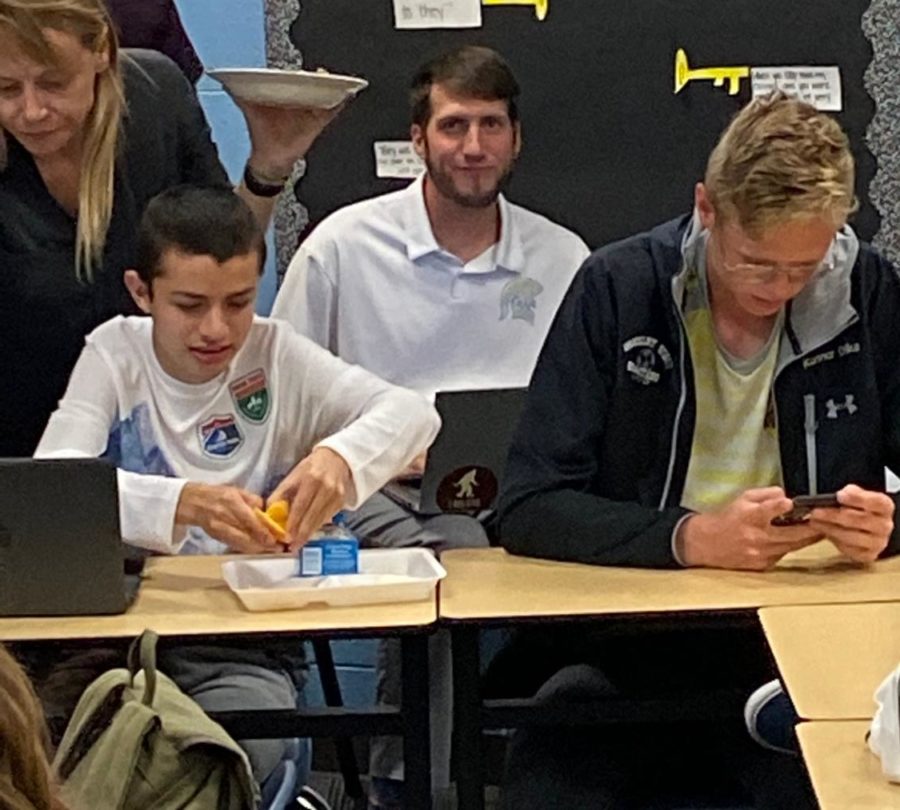 Mr. Ryan Hilbig listens into stduents during the last Student Council meeting on Tuesday as they prepared for Homecoming.  Hilbig is enjoying his new job as an Athletic Director.