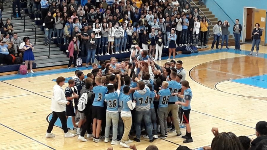The Greeley West football team rallies the student body during the assembly on Friday.