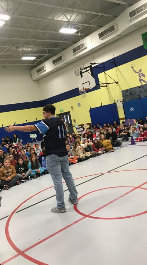 Greeley West senior Aaron Rojas presents about sportsmanship at Monfort.  