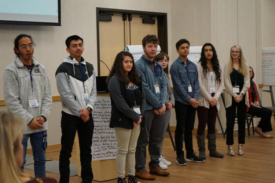 Students from around Greeley present to a room setting goals for District 6 in the next ten years.  Sophomore Emma Rodas, junior Anuj Panta, and senior Grace Chahal took part in the group.