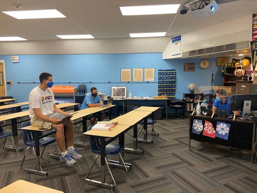 Greeley West World Studies teachers Mr. Stephen Paulson, Mr. Taylor Juarez, and Mr. Cody Jiru plan for the first week of instruction this year on Thursday.