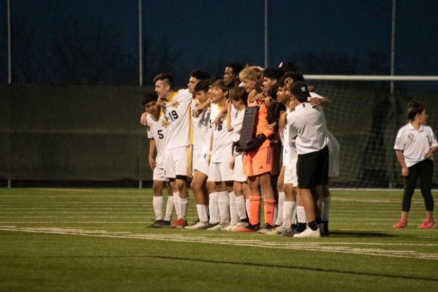 Goalkeeper Tommy Roth celebrates winning the MVP award with his team after West beat Central 1-0 on Monday night. 
