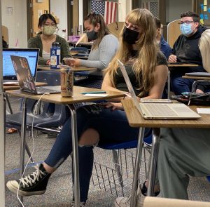 Greeley West senior Kayla Becker listens to her teacher during IB History 2 on Tuesday. Becker was recently accepted to Cornell University. 