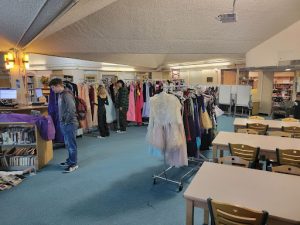 Greeley West students peruse Promwear during on Monday.  Aubreys Closet provided an opportunity for students to get dresses and accessories for April 30s Prom. 