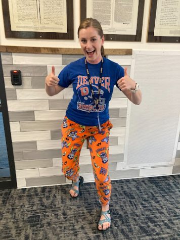 Social Studies teacher Ms. Nicole Jewett shows off her spirit wear and Broncos gear.  