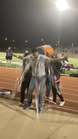 Mr. Stephen Paulson received his ice cold bath at the West-Central football game. 