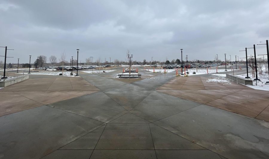 Snow at the main entrance of Greeley West High School melted away today, but will pose a greater challenge to the custodial staff as temperatures drop and winter arrives.  