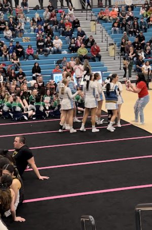 The Greeley West cheerleaders receive their trophy at the Sweetheart Blast.