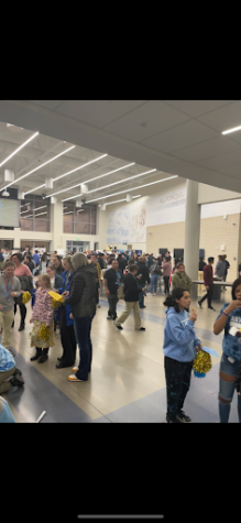 Controlled chaos breaks out in the commons as 600 families explored opportunities at Greeley West during Freshmen Registration night. 