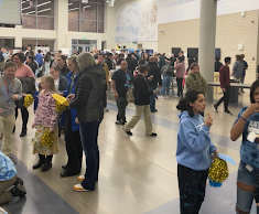 Controlled chaos breaks out in the commons as 600 families explored opportunities at Greeley West during Freshmen Registration night. 