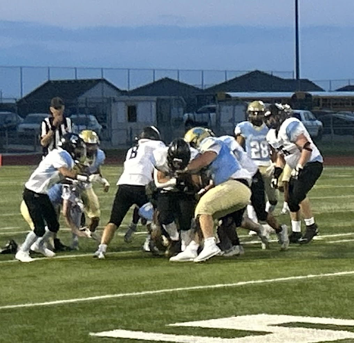 Senior Cole Nohr makes a tackle early in Thursday Night's game against Mountain Range.         