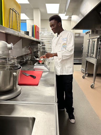 Senior Omari Edwards concocts his next famous dish in the food science kitchen. last week. 