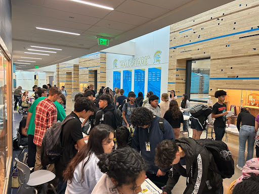 Greeley West students rush the Spine to learn more about clubs at the school (and to earn ice cream).