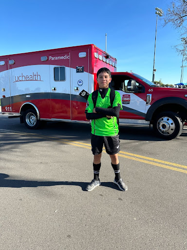 Emmanuel Silva spends his Sundays refereeing soccer and posing in front of ambulances.  
