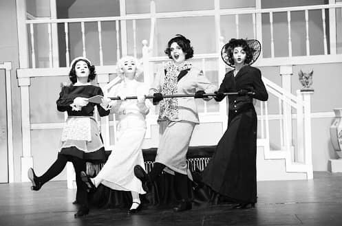 This isnt an old picture.  All the actors and props are in black and white to make Somethings Afoot feel like a 1920s movie.  Get out and see it this weekend. 