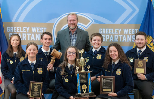 The Greeley West FFA Parliamentary Procedure team poses with their trophy.  Pictured are:  Chair Adian Adtteri, Secretary Kadie Childers, Kailtyn Fenton, Ena Gibson, Sarah Porter, Tucker Hurley and Autumn Schoepner. 
