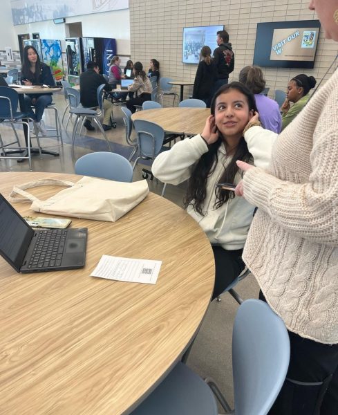 Junior Meah Delgado answers questions about her personal project last year following her presentation.  Delgado was just one student shocked by their low MYP score on the capstone project.