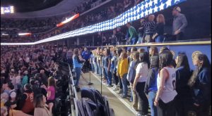The Greeley West choir sings the National Anthem at the Nuggets game on Thursday.  