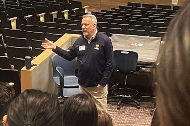 UNCs Chief Financial Officer Dale Pratt presents to AVID students earlier this week.   