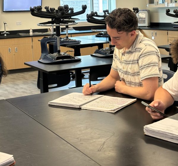 Boettcher winner Aiden Datteri takes notes this week in his science class.  He could be off to CSU next year for free, if he doesnt become a state representative for FFA first. 