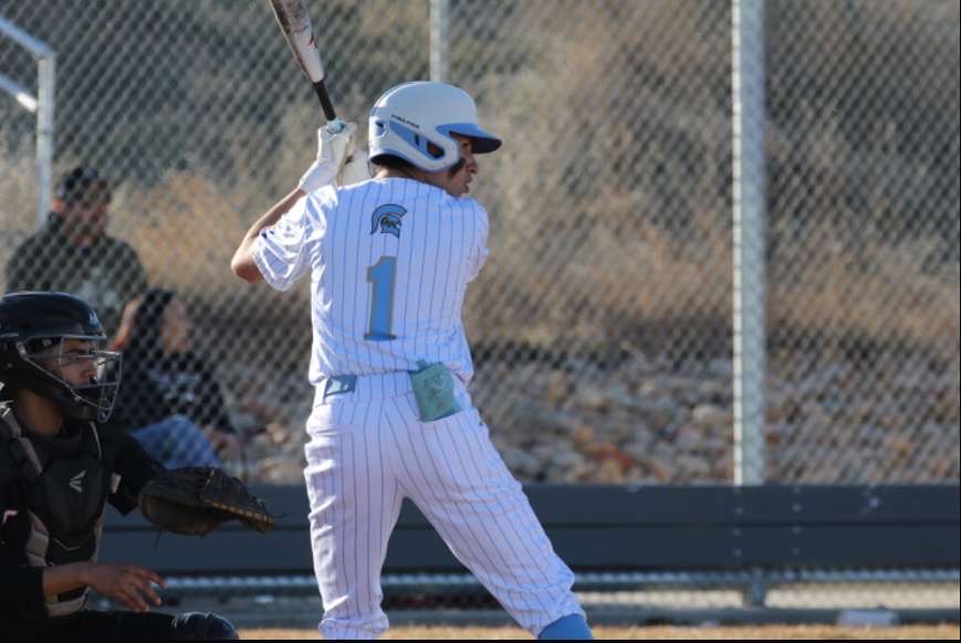 Senior Ethan Guest takes an at-bat earlier this season.  Guest recently committed to play baseball at Hastings College.