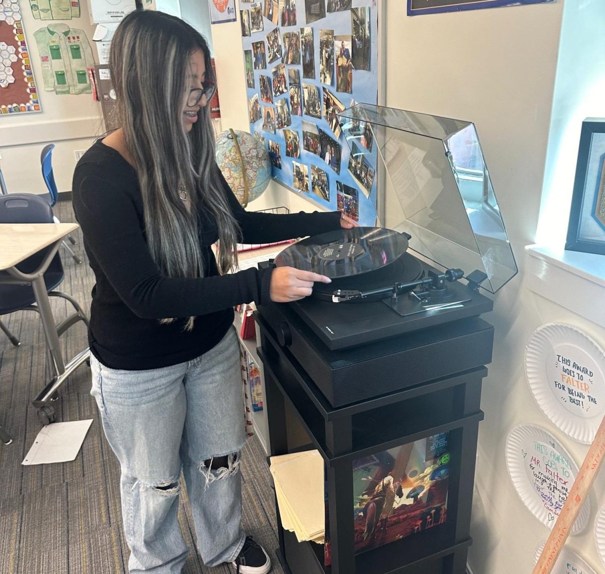 Sophomore Adrianna Valladares gets set to spin Al Green's Greatest Hits at the Wax Pack on Thursday afternoon. 