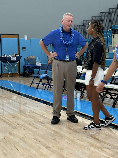 New head coach Ryan Knoblock shrugs at the events of Wednesday night's volleyball match at Greeley West High School.  Knoblock is one of several new in-building coaches this year. 