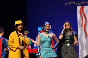 Sarah Reinhard (center) acts during Mean Girls last Spring. Sophie Dhupar and Hailey Thompson accompany her.  