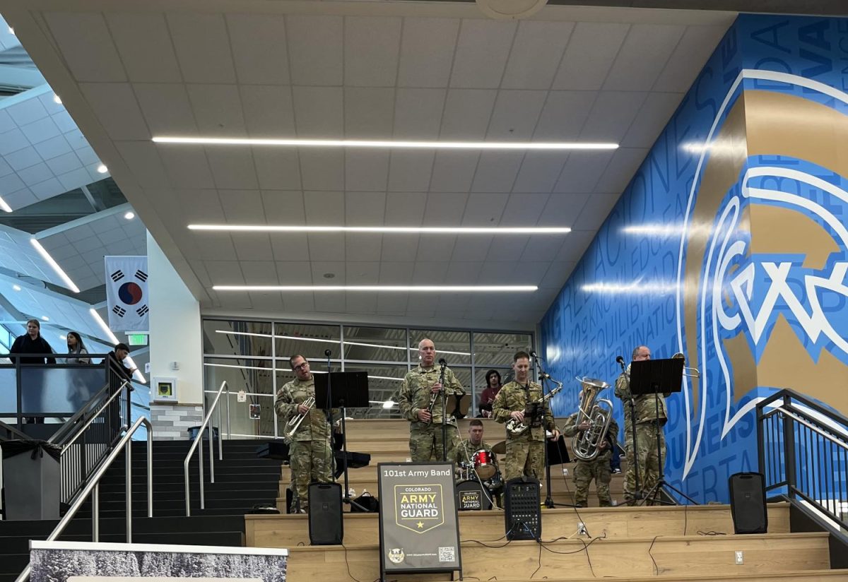 The 101st Army Band plays for students before school on Monday.