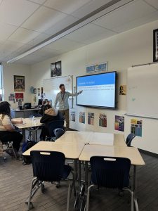 Mr. Shawn Briggs, one of the teachers in the No-Shave November competition, teaches his fifth period.  Check out that moustache!