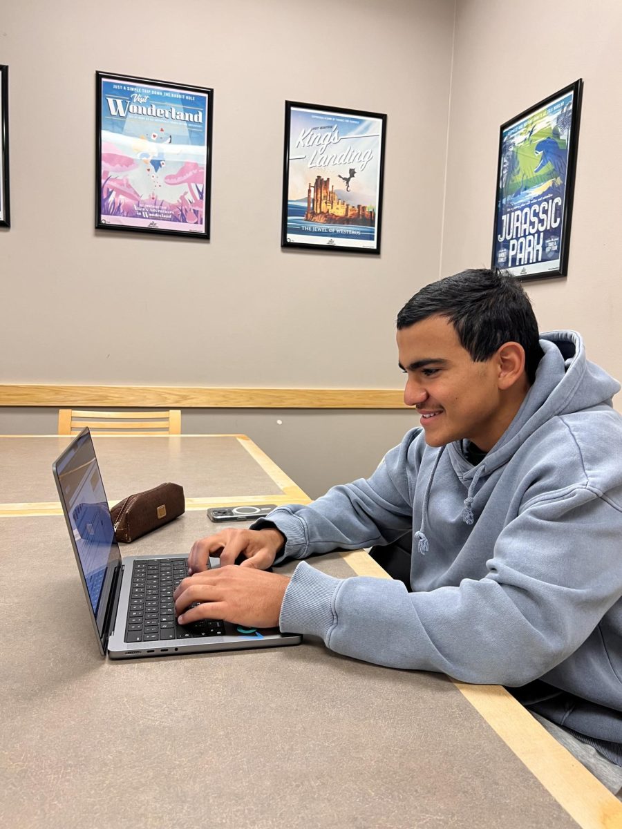 Ram Mustafa works in a local library studying.