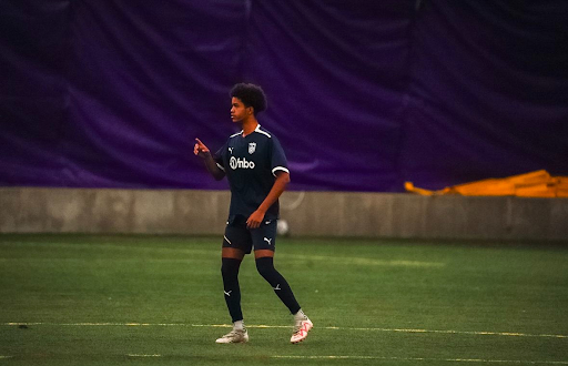 Henos Berhane plays soccer during one of his club games for the Hailstorm academy.